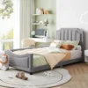 Upholstered Twin Daybed with Scalloped Headboard